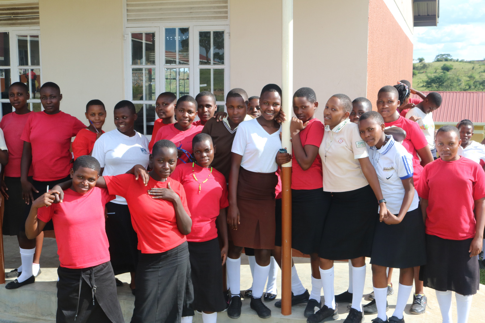 Smiling, but informed. These girls had just concluded a school outreach session on sexual and reproductive health and rights, including how to identify abuse, where to report it, and how to protect themselves. Every conversation like this helps equip them not only with knowledge, but with the courage to speak, act, and protect their futures.