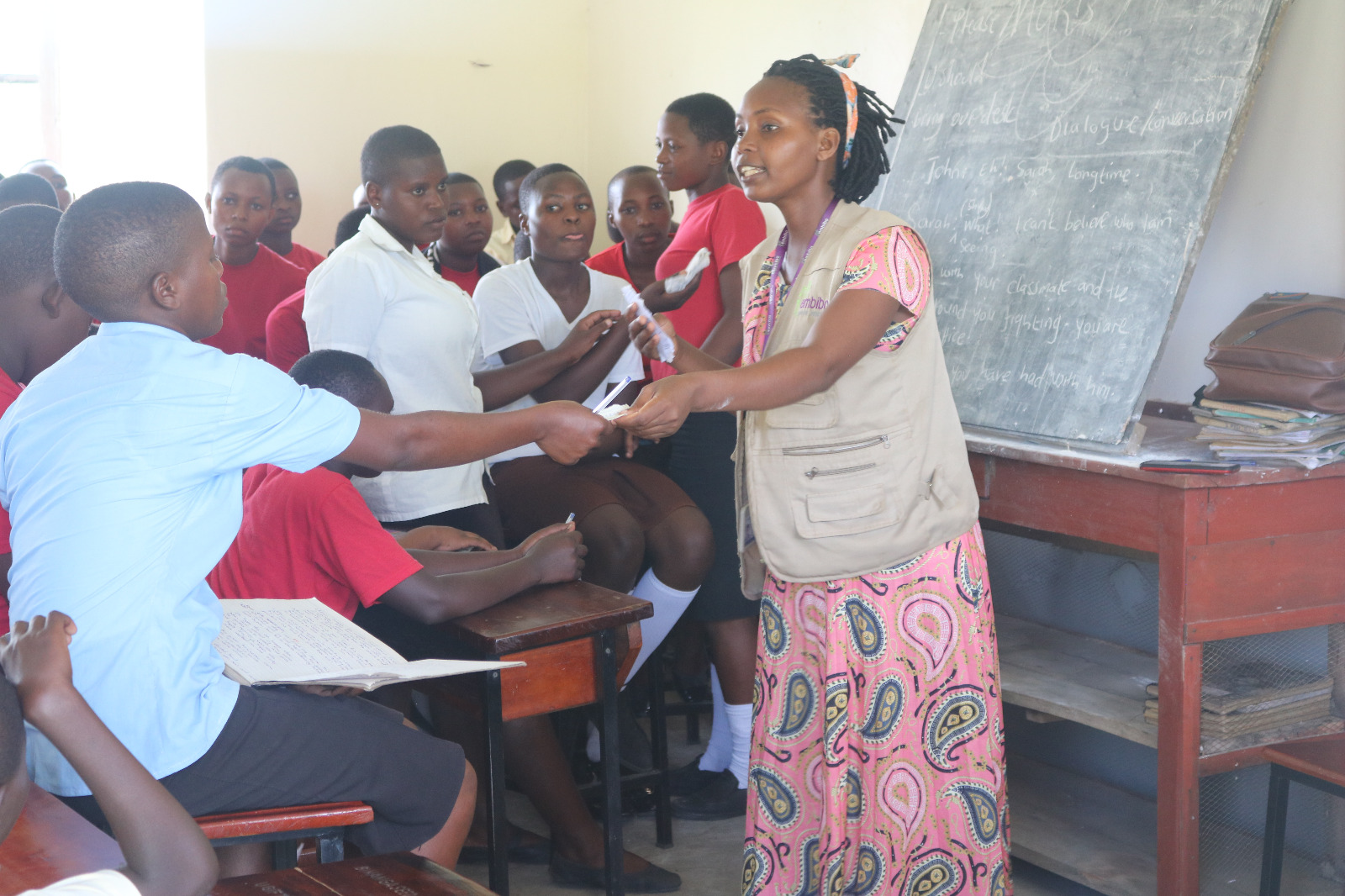 Our Adolescent Girls and Young Women (AGYW) Officer, Atukwase Sharon, engaging with students at Bihanga Senior Secondary School, Kamwenge, during a recent sexual and reproductive health and rights (SRHR) outreach. These sessions create safe spaces for young people to learn, ask questions, and access information they are often denied.
